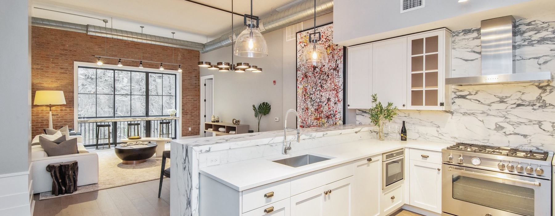 a kitchen with white cabinets