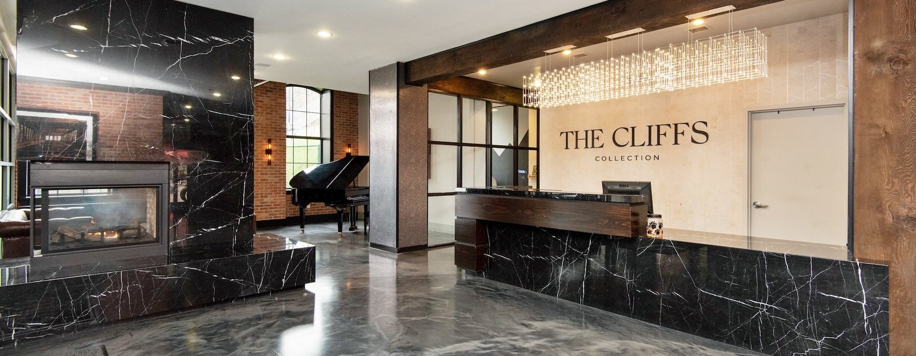 a lobby with a front desk area