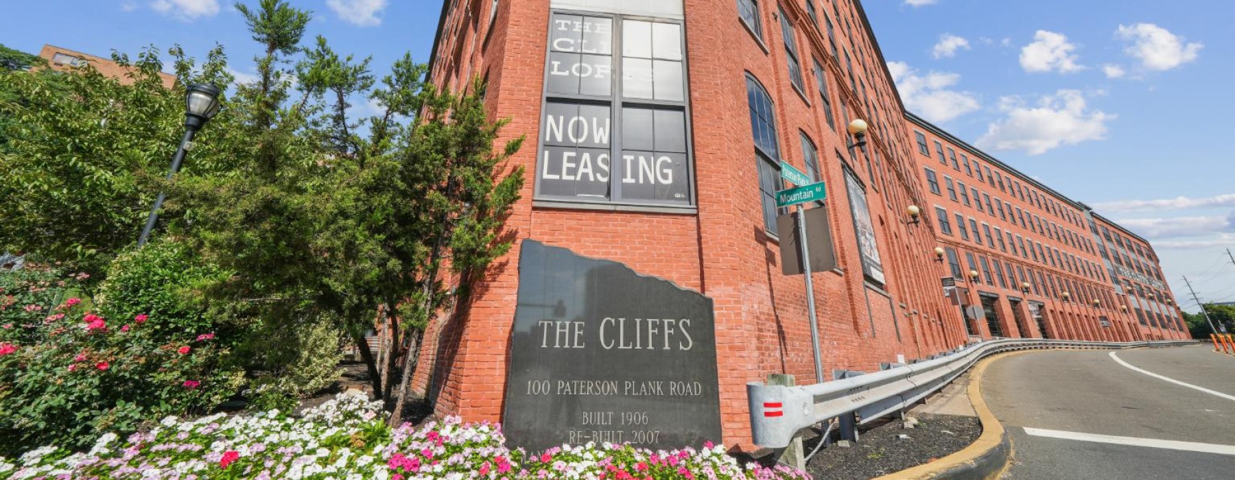 The Cliff Lofts exterior building with garage access for our Jersey City, NJ apartments.