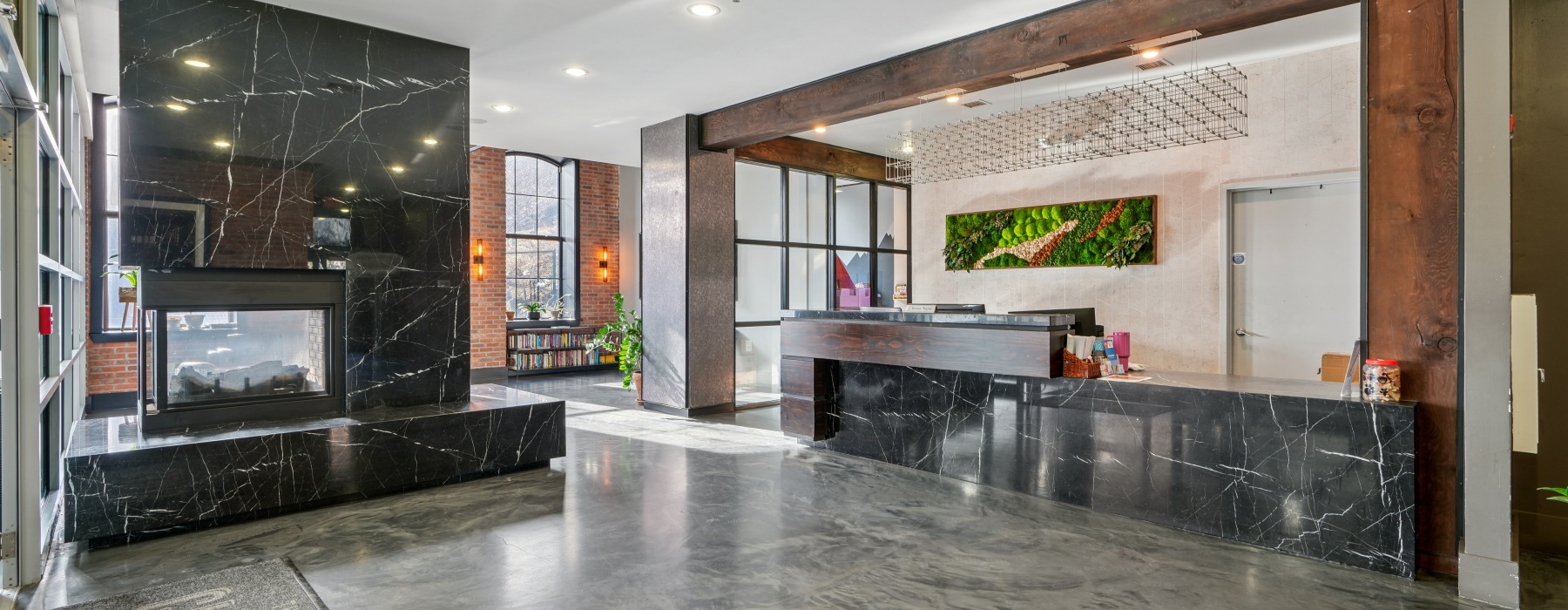 a lobby with a front desk area